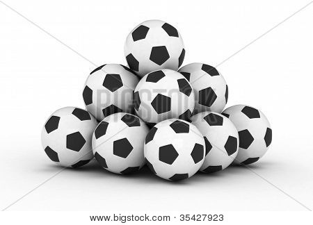 Stack of piled up football soccer balls