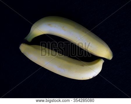 Fresh Cavendish Banana On Black Background. (fruit For Health)