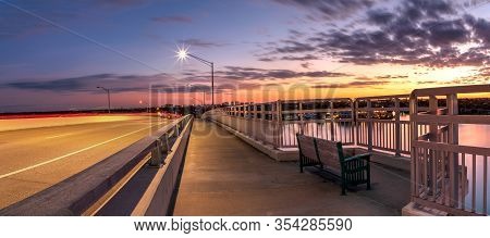 Light Trails From Cars Headed Across The Ss Jolley Bridge Into Marco Island, Florida.