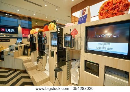 SINGAPORE - JANUARY 20, 2020: self-checkout facilities at Jasons Deli in the Shoppes at Marina Bay Sands. Jasons Deli is a supermarket and delicatessen.