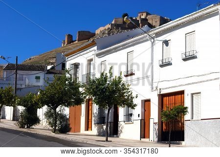 Estepa, Spain - November 13, 2008 - Townhouses In The Lower Part Of Town With The Santa Clara Conven