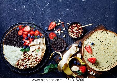 Indonesian Traditional Sweet Turnover Pancake Martabak Manis With Chocolate Chips, Peanuts, Strawber