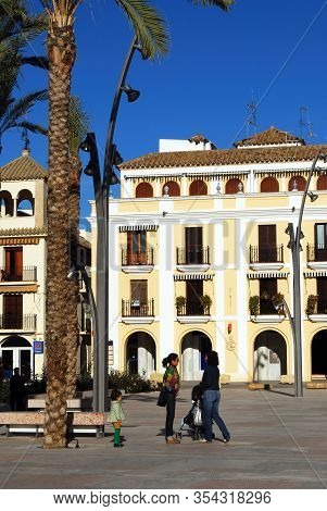 Ecija, Spain - November 13, 2008 - Traditional Spanish Buildings Around The Plaza De Espana In The T