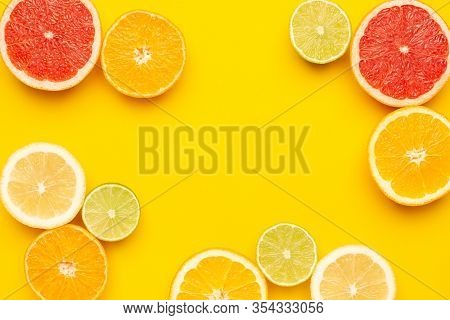 Citruses Fruits On Yellow Background, Fruit Flatlay, Summer Minimal Compositon With Grapefruit, Lemo