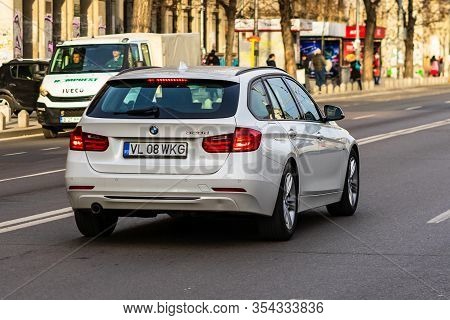 White Bmw 320d In Traffic Of Downtown Bucharest, Romania, 2020.