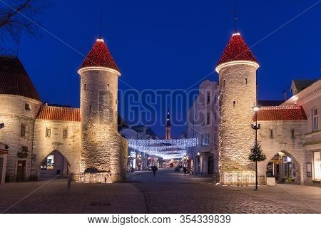 Tallinn, Estonia - January 12, 2018: Night View Of The Famous Medieval Viru Gate With Christmas Deco