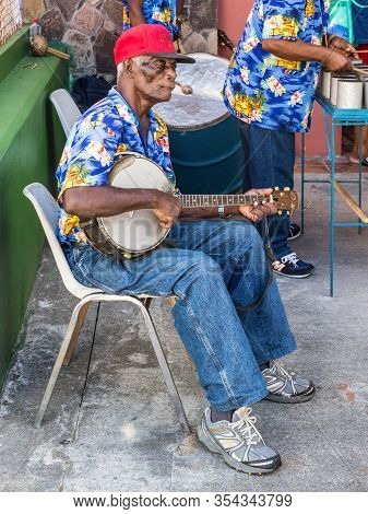 Kingstown, Saint Vincent And The Grenadines - December 19, 2018: The Musicians Greets Visitors At Th