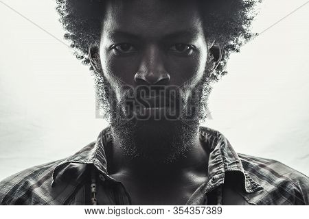Clouse Up Portrait Of Afroamerikaner In A Checkered Shirt