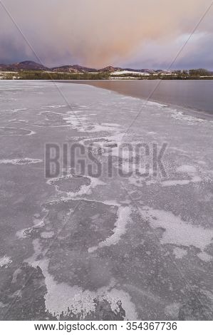 Frozen Colorado Lake At Sunrise