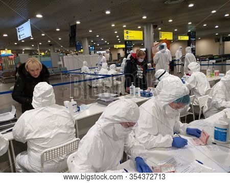 Sheremetyevo, Moscow, Russia - March 4, 2020: Medical inspection and survey for COVID-19 fot flight arrived from Italy in Sheremetyevo airport, Terminal F, Russian Federation
