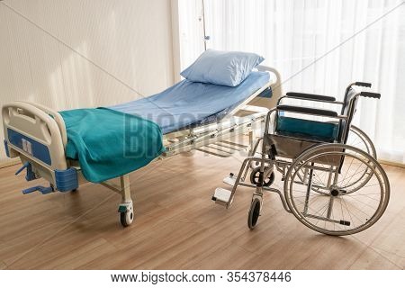 Hospital Bed And Wheelchair At The Hospital Room