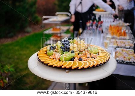 The Buffet In The Open Air. Plate With Fruit Slicing.
