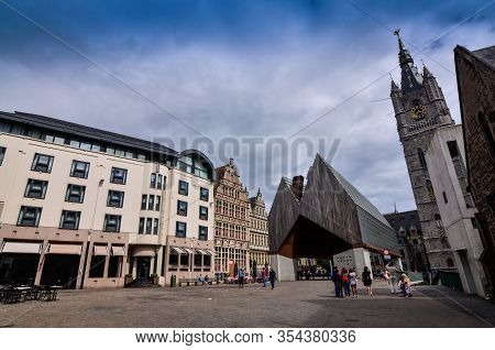 Ghent, Belgium, August 2019. The Imposing Bell Tower Called Beffroi, With Its Grandeur Stands Out Co