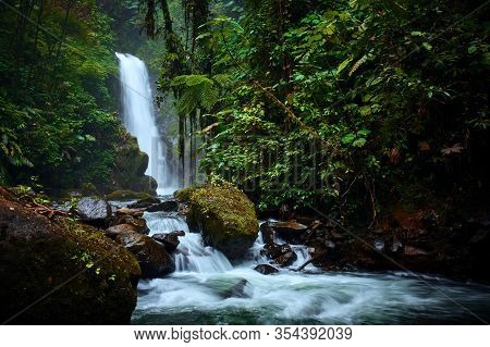 Big Waterfall In Tropical Forest. La Paz Waterfall Garden, Beautiful Tourist Place In Costa Rica.