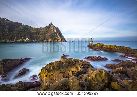 Beautiful Surroundings Of The Lighthouse Of Pasaia San Juan A Sunrise. Basque Country