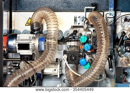 The System For Removing Dust And Wood Shavings From A Modern Woodworking Machine Using Airflow Sucti