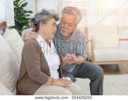 Sick Asian Senior Woman Or Grandmother Is Fainted And Fallen On Floor, Grandfather Help,care,support