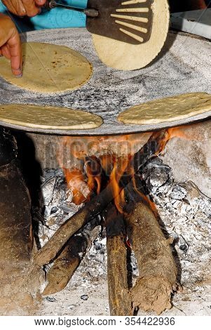 Making Tortillas Over A Wood Fire In El Fuerte, Sierra Madre Occidental, Sinaloa State - Mexico
