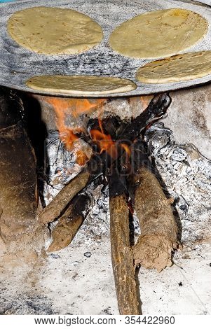 Making Tortillas Over A Wood Fire In El Fuerte, Sierra Madre Occidental, Sinaloa State - Mexico