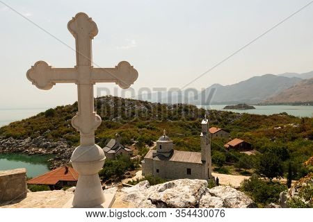 Beska Female Monastery. Murichi. Montenegro. Cross On The Top Of The Mountain.