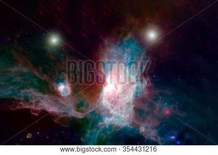 A Beautiful Nebula Of Different Colors, With Stars And Galaxies. Elements Of This Image Were Furnish