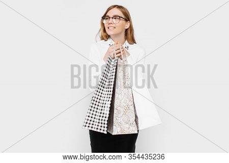 The Image Of A Young Pregnant Businesswoman With Glasses, Happy Girl Holding Shopping Bags, Shopping