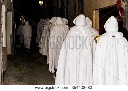 Puget-theniers, France - February 26, 2020: The Traditional Annual Parade Of White Penitents