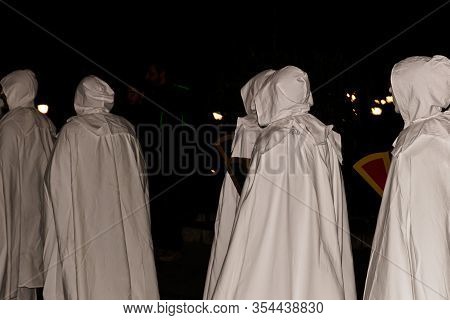 Puget-theniers, France - February 26, 2020: The Traditional Annual Parade Of White Penitents