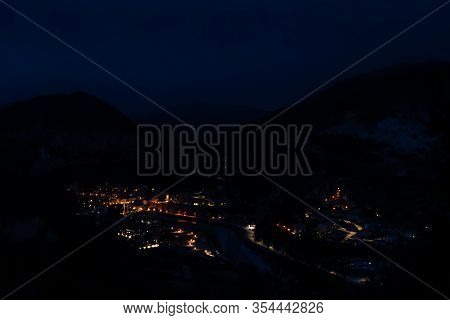 The Panoramic View Of A Medieval French Village Puget-theniers At Night In The Dark