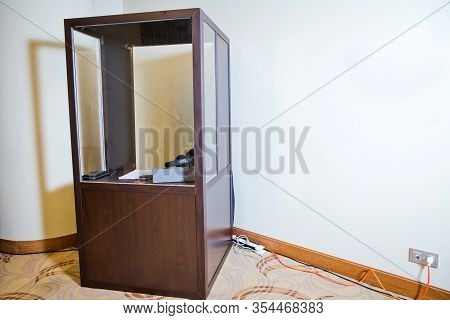 Interpreting - Microphone And Switchboard In An Simultaneous Interpreter Booth . Soft Focus Of Wirel