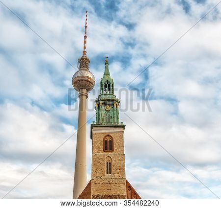 Berlin, Germany - December 9, 2019: Belltower Of St. Mary's Church Or Marienkirche. Tv Tower Near Th