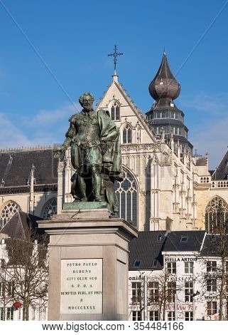 Antwerp, Belgium - February 6, 2020: Statue Of Petro Paulo Rubens With The Cathedral Of Antwerp In T