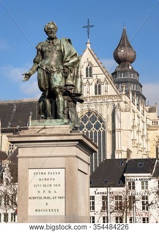 Antwerp, Belgium - February 6, 2020: Statue Of Petro Paulo Rubens With The Cathedral Of Antwerp In T