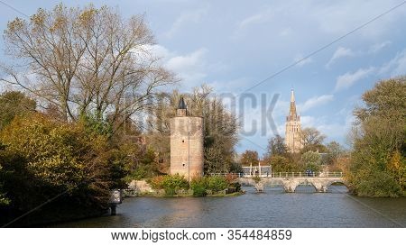 Bruges, Belgium - November 2, 2019: Panoramic Image Of The Minnewaterpark In Bruges With Historic Bu