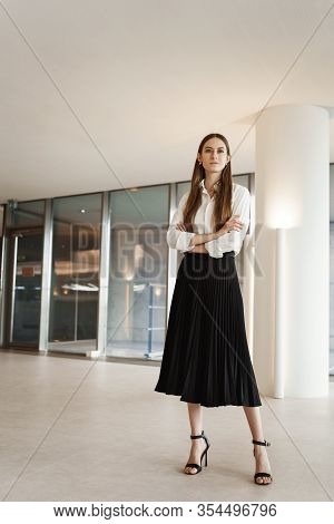 Vertical Shot Of Proud And Confident, Successful Businesswoman In Company Office, Standing Assured W