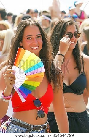 The Annual Parade Lgbt. Portrait Of Two Lesbians In The Gay Pride Parade. Parade Of Tolerance. Rainb