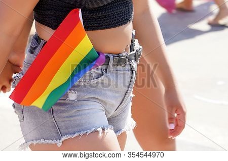 Woman Lesbian Walking In The Gay Pride Parade. Parade Of Tolerance. The Annual Parade Lgbt. Rainbow 