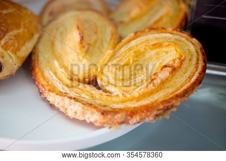 Close Up Of French Palmier Cookies In A Plate