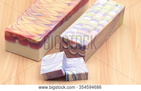 Handmade Soap Blocks And Slices On Wooden Display