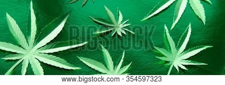 Cannabis Leaf Made Of Paper On Green Background