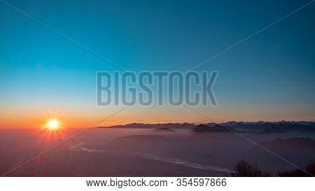 Winter Sunset From An Alpine Peak Of Friuli-venezia Giulia