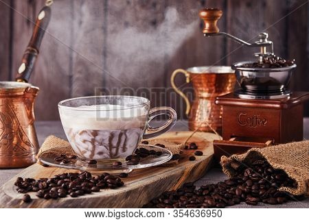Cappuccino Is An Espresso-based Coffee Drink And Steamed Milk Foam Made From Coffee In A Transparent