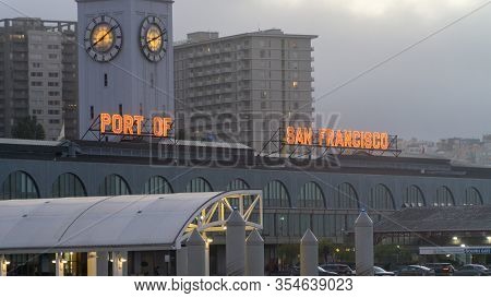 San Francisco, Usa - August 2019: Port Of San Francisco Sign In Red Lights In The Evening