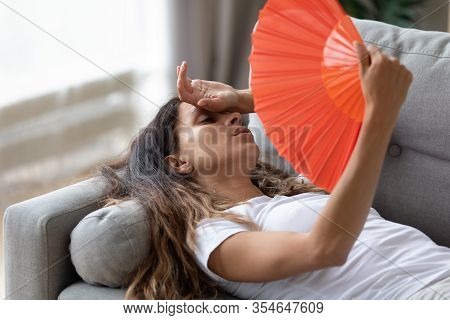 Exhausted Woman Use Hand Fan Suffer From Heat