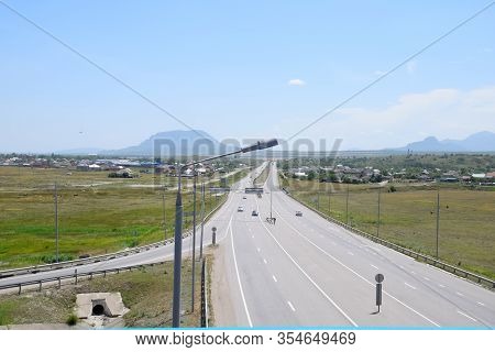 The Road Crossing Is Adjacent To The Secondary Road.