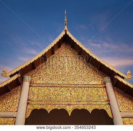 Exterior Detail Of The Golden Viharn (ceremonian Hall) Of The Wat Chedi Luang Temple At Sunset In Ch