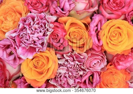 Wedding Flowers: Roses, Carnations And Listianthuis In Various Shades Of Pink And Orange
