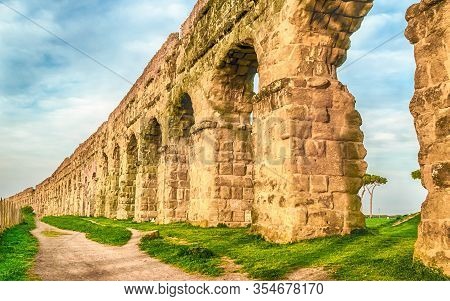 Ruins Of The Iconic Parco Degli Acquedotti, Rome, Italy. The Public Park Is Named After The 7 Ancien