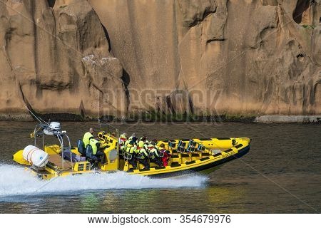 Vestmannaeyjar Iceland - August 9. 2019: Rib Safari Boat Sailing In The Narrow Seas Of Heimaey Islan