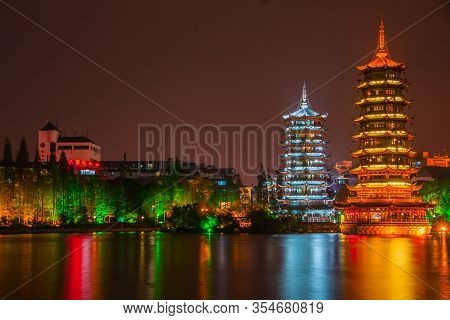 Guilin, China - May 9, 2010: Riyue Shuangta Cultural Park. Wide Shot On The Twin Pagodas In Shanhu L